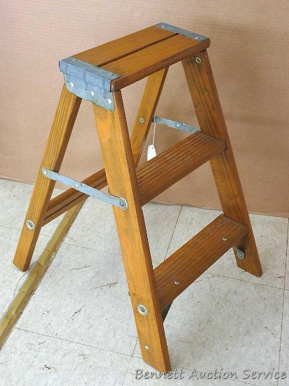 Nice sturdy folding step stool.12-1/2" x 22-1/2" tall.