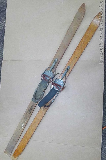 Wooden Lund cross country skis would make a neat display. Measure about 65" long.