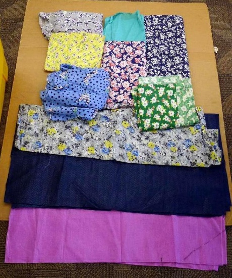 Box of vintage material incl flowered, polka dot, plain, more. Some spots noted, may just wash out.