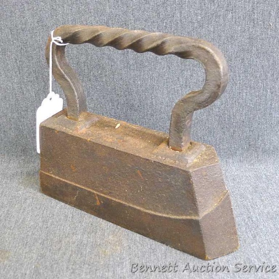 Large vintage iron would make great door stop; measures 9" x 2-1/2" x 8" tall.