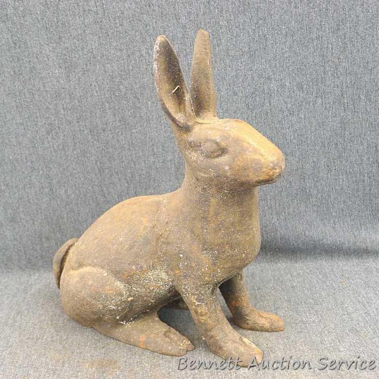 Cast iron rabbit would make a neat doorstop and matches the other on in lot 129. Measures about 10"