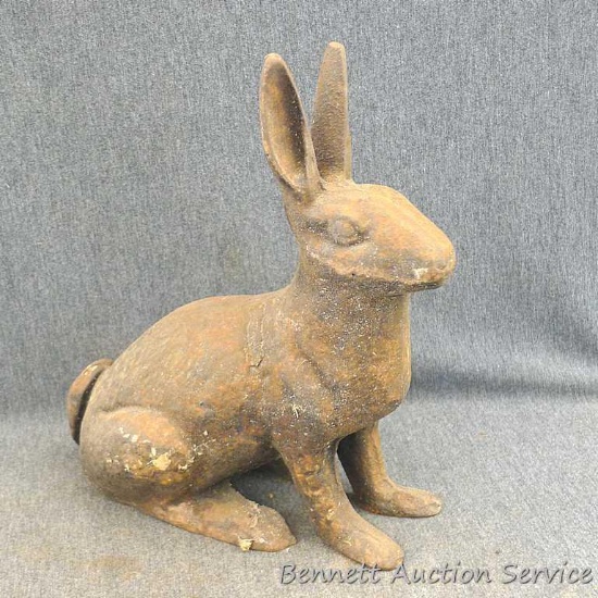 Cast iron rabbit would make a neat doorstop and matches the other on in lot 128. Measures about 10"