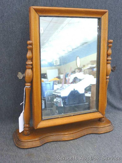 Free standing vanity mirror is about 14" x 16" overall and in good condition.