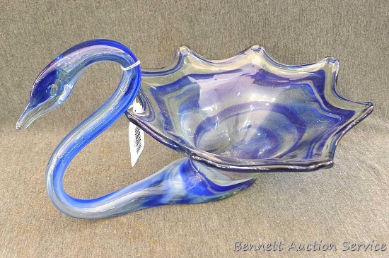 Eye catching blue blown glass swan is about 11-1/2" x 15" x 8" tall. Looks to be in good condition.