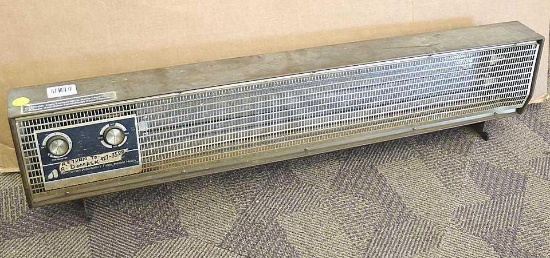 Electric baseboard heater model 49H30 measures approx.. 40" x 9" x 4", heats.