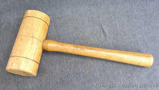 Wooden mallet; measures 2-1/2" x 5-1/2" x 12-1/2" long with handle.