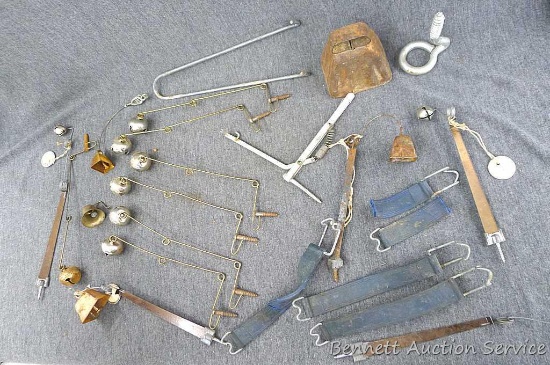 Assortment of vintage bells and straps. Largest bell measures approx.. 3" x 3" x 2-1/2". Straps