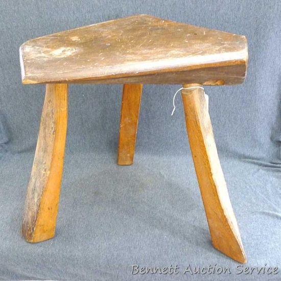 Rustic milking stool; measures 16" x 20" x 17" tall.
