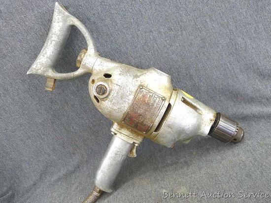 Dunlap, Half Inch, Electric Drill model 107.1344 measures approx.. 15" x 10"x 4", runs.