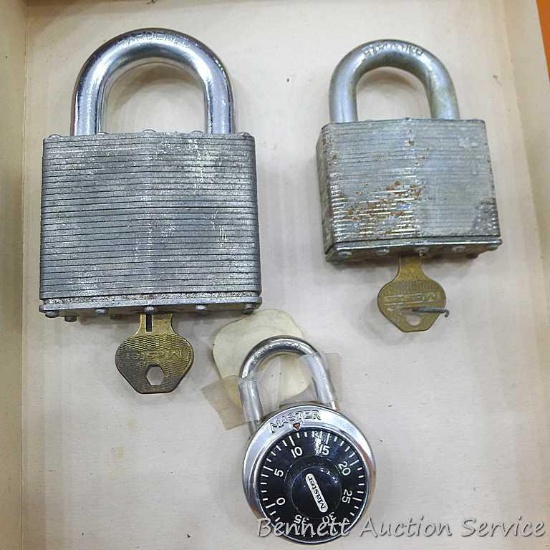 Master pad locks and combination lock. Largest pad lock measures approx.. 4-1/2" x 1" x 1-1/2".