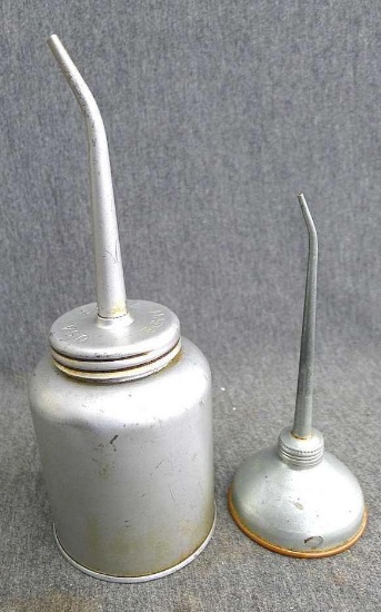 Eagle and other vintage oiling cans. Largest is approx.. 8" x 3".