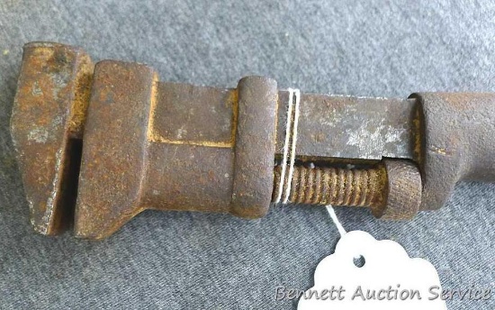 Coe's adjustable mechanics wrench with original wooden handle measures approx.. 8-1/2" long.