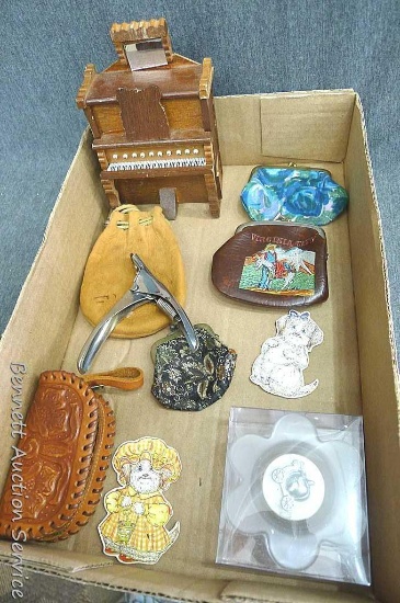 Miniature piano music box, three coin purses, leather pouch, candle, "Jacks" pouch, and more. Piano