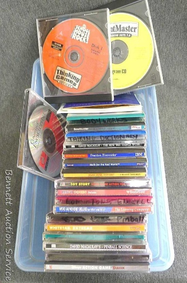 Box of computer game cd's whitetail hunting game, pin ball science, toy story, new ways things work,