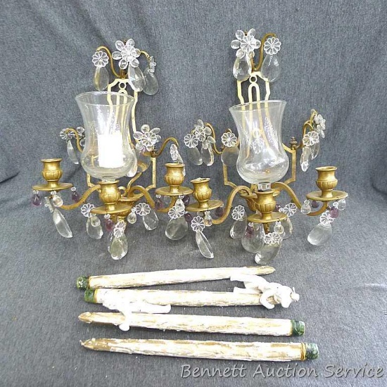 Solid brass wall mounted candle holders with glass globes and decorative wooden candles with angel