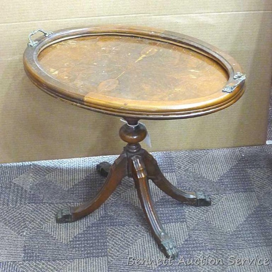 Tea table to serve your guests; measures 23" x 16" x 19-1/2" tall.