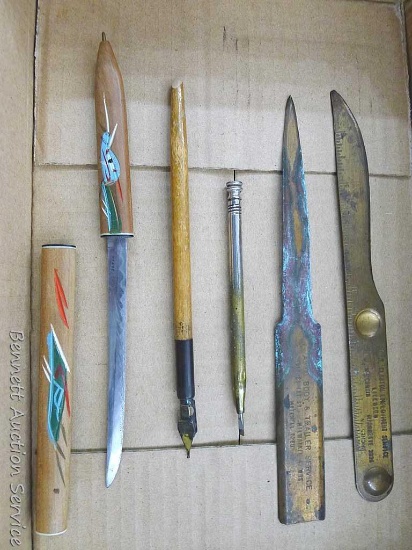 Vintage promotional letter openers, quill pen, and a neat multi-tool. Wood-encased opener marked