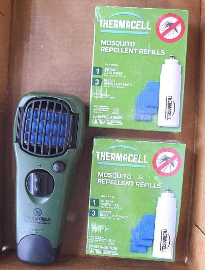 Therma Cell mosquito repellent and two NIP boxes of repellent refills. ThermaCell about 8" long.