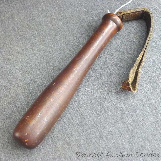 Wooden tire knocker or midnight persuader; measures 1-1/2" x 9" long without strap.