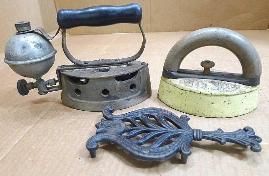 Vintage gas iron, Potts Best on Earth size 3 sad iron, and a cast iron Wilton trivet. Largest about