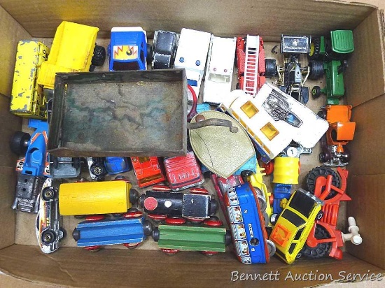 Matchbox, Hot Wheels, Tonka, Ertl and other cars, trains, etc. Yellow Tonka dump truck about 3-1/2"