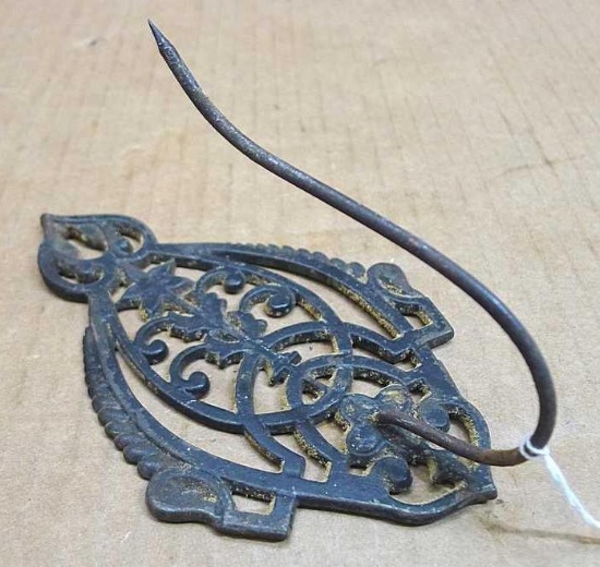 Antique cast iron receipt holder would be neat made into a towel holder in your kitchen. Measures