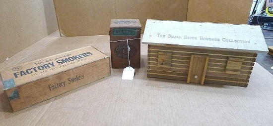 El Producto Queens wooden cigar box, bourbon log cabin box, and a Factory Smokers wooden cigar box.