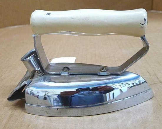Vintage General Electric Hotpoint Calrod iron could be used as a doorstop or to hold down a large