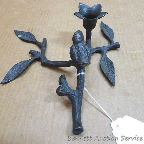 Cast iron bird candle holder is about 10" x 9" x 3" high.