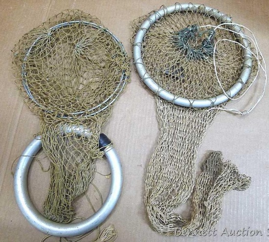 Two fish or bait storage nets have aluminum float rings, 11-1/2" and 9" wide. Nets are about 39" and