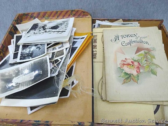 A bunch of photographs, mostly black and white. Also includes a copy of a birth certificate filed in
