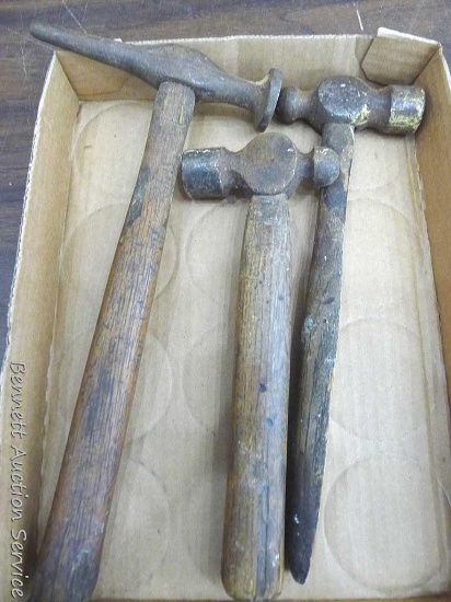 Two ball peen hammers and a body shop hammer up to 12" long. Longest head is almost 6".