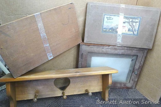 Shadow box, shelf with hooks, and two wooden lids - one has Mother Hubbard graphics. Shadow box