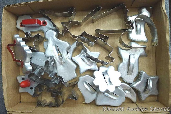 Cookie cutters incl gingerbread women, bear, horse, Christmas tree, star, more. Largest about 6"
