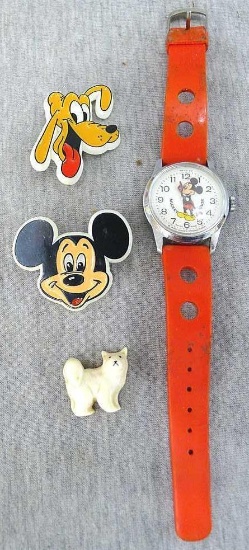 Bradley Swiss-made Mickey Mouse watch, Mickey Mouse and Pluto pins, and a little cat. Watch band