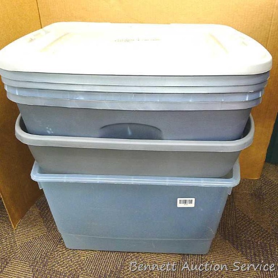 Rubbermaid and other totes, some with lids. Rubbermaid is about 21" x 17" x 12". Crack noted in rim