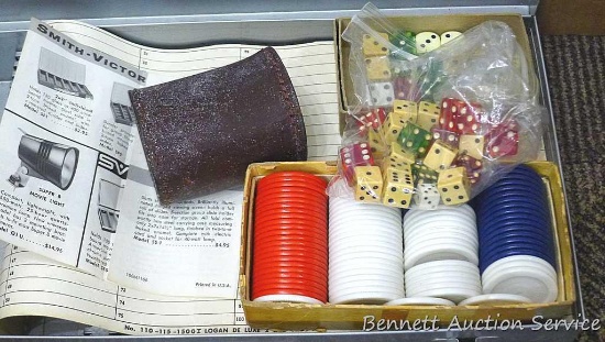 Poker set incl a ton or dice, chips, leather dice cup and some type of organizer case. Case about