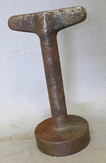 Intriguing cast iron mystery wrench is 4-1/2" long and is marked Wolta 425. E-mail me if you know
