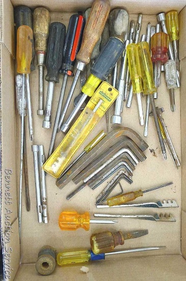 Assorted drivers, glass cutters, hex wrenches, and more.