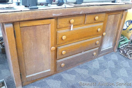 Large, very sturdy, work bench or DIY project with five drawers and two cupboards. Top is rough and