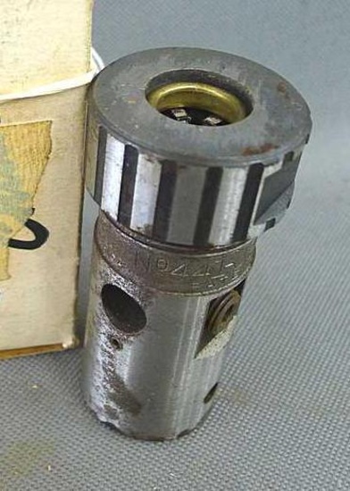Jacobs chuck no. 441-J9 tap holder has a 1/2" square drive and holds taps no. 10 to 1/2". Nice for
