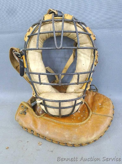 Vintage Spalding catchers mitt and mask with markings 60-41 12. Mitt is professional model and