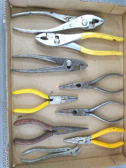Needle nose and other pliers. Largest measures approx.. 8" long.