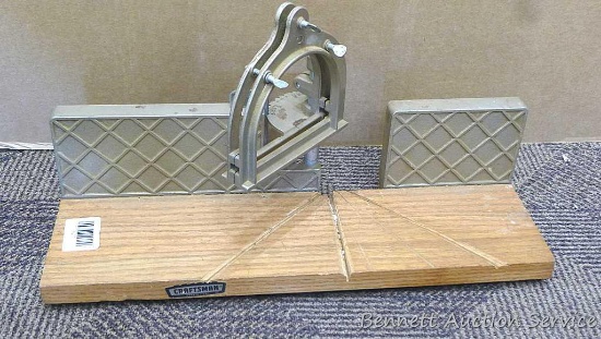 Craftsman miter box saw guide model 881.3634 which measures approx.. 18" x 5-1/2" x 7". Saw guide is