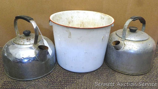 Two tea kettles and one antique bucket. Kettles are in great shape and should clean up nicely.