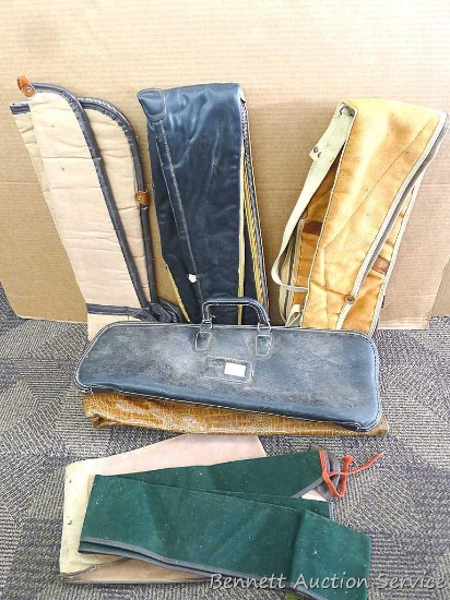 Various canvas and other gun scabbards plus padded case possibly for a fishing pole. Longest