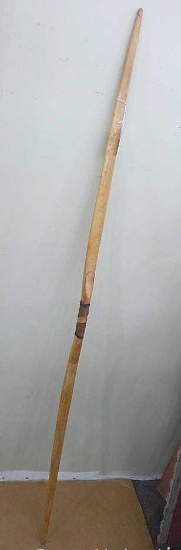 Wooden recurve bow is about 5' long unstrung. Bow looks to be in good condition. The only markings I