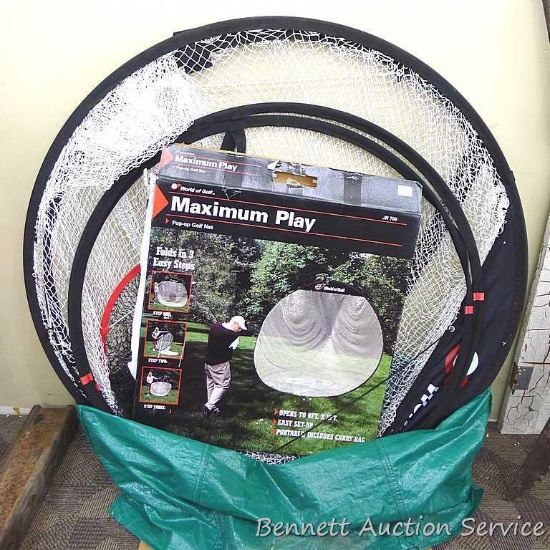 World of Golf maximum play pop-up golf net with box. Opens to 8' x 8'. Two small holes noted as