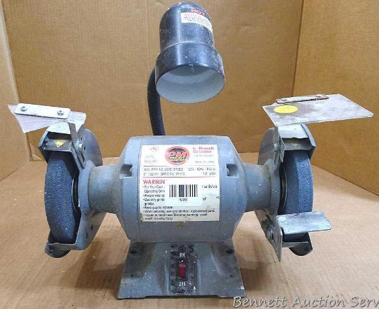 6" bench grinder with light is 1/3 HP and has a 3500 RPM load speed. Has a 1/2"arbor, runs and is