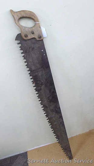 One man saw has a Warranted Superior emblem. About 54" long overall.